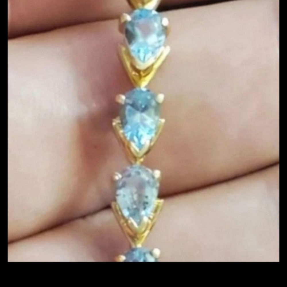 14k yellow gold blue topaz bracelet! This will fit up to about 6 3/4 inch wrist. - Picture 6 of 6